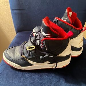 Boys 4.5 size Jordan Nike slightly worn well taken care of tennis shoes.